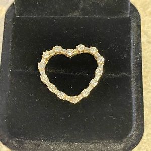 14k gold and diamond heart pendant. All genuine.